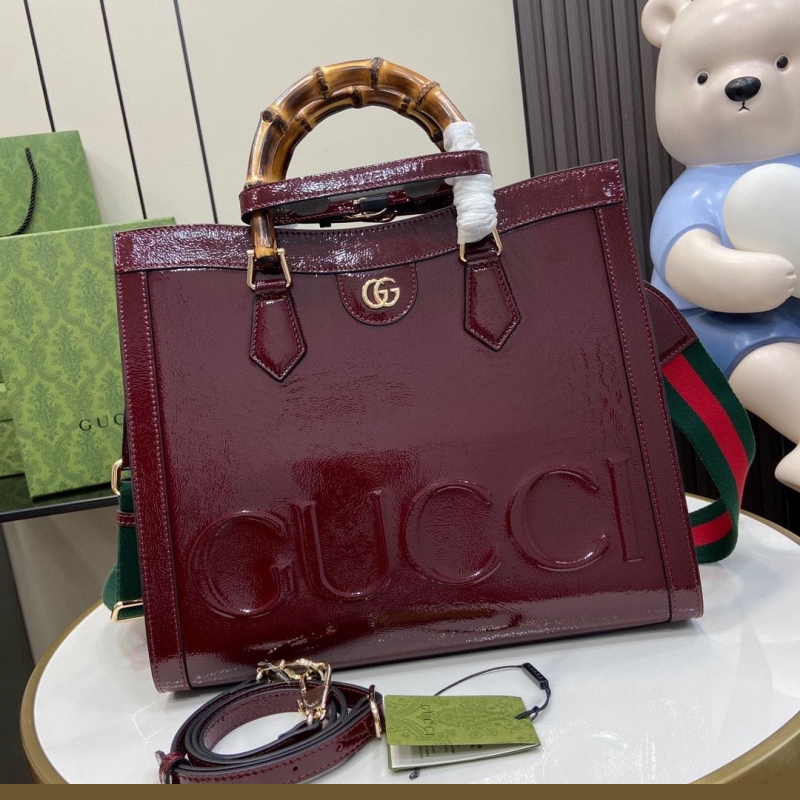 G*u*i top handle bags